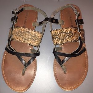 Brown and black sandals